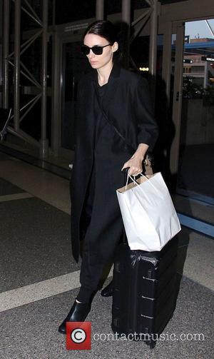 Rooney Mara - Rooney Mara and her boyfriend Charlie McDowell arrive at Los Angeles International (LAX) airport. at LAX -...