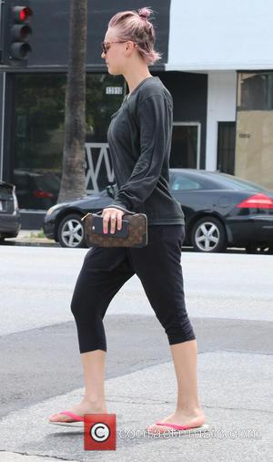Kaley Cuoco - Kaley Cuoco with her dyed pink hair tied back into a bun, leaves her yoga class in...
