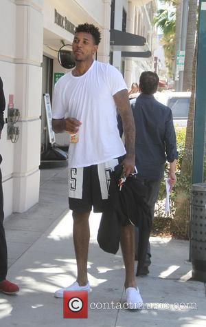 Nick Young - Iggy Azalea's recent fiancé Nick Young goes shopping in Beverly Hills - Los Angeles, California, United States...