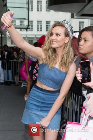 Little Mix and Perrie Edwards - Little Mix pictured leaving the Radio 1 studios after performing on the Live Lounge...