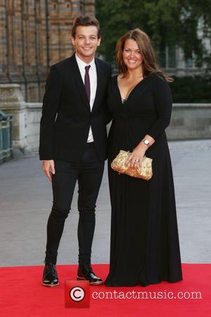 Louis Tomlinson with his Mother Johannah Deakin at the Believe In Magic Cinderella Ball held at the Natural History Museum...