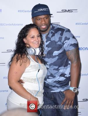 50 Cent , Curtis James Jackson III - 50 Cent signs his Studio Mastered Sound Headphones by Curtis '50 Cent'...