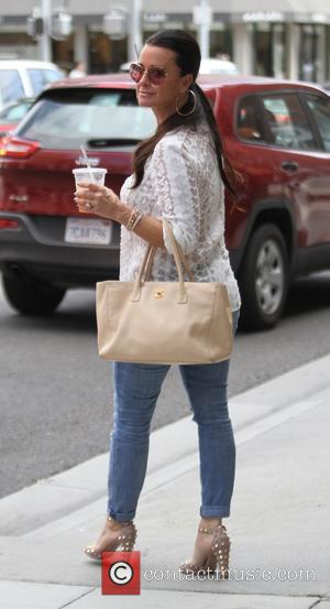 Kyle Richards - Kyle Richards has lunch with a friend at Comoncy cafe in Beverly Hills - Los Angeles, California,...