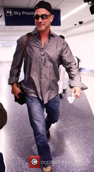 Christopher Meloni - Actor Christopher Meloni arrives at Los Angeles International Airport (LAX) at LAX - Los Angeles, California, United...
