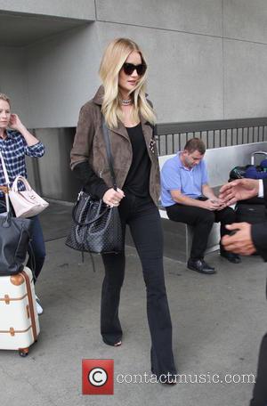 Rosie Huntington-Whiteley - Rosie Huntington-Whiteley arrives at Los Angeles International Airport (LAX) - Los Angeles, California, United States - Friday...