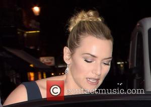 Kate Winslet - Kate Winslet leaves her hotel with family and friends for the 'Steve Jobs' premiere - London, United...