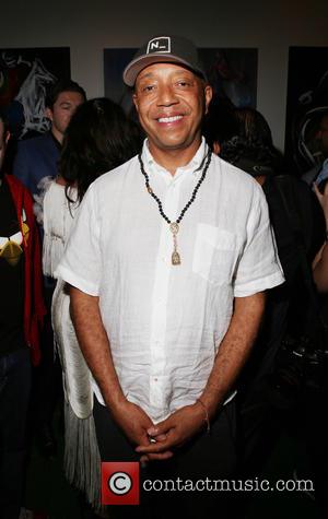 Russell Simmons Accused Of Rape In $5 Million Lawsuit