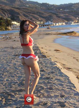 Blanca Blanco - Blanca Blanco poses in festive lingerie on the beach in Malibu at malibu - Los Angeles, California,...