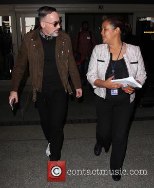 David Furnish - David Furnish arrives at Los Angeles International (LAX) Airport - Los Angeles, California, United States - Tuesday...