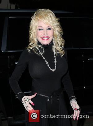 Dolly Parton Picks Up TWO Guinness World Records