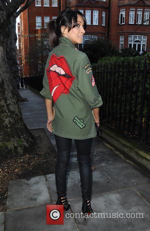 Jackie St Clair - Jackie St Clair poses for pictures wearing a Rolling Stones jacket whilst on her way to...