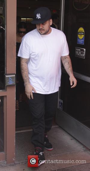 Rob Kardashian - Kim Kardashian, Rob Kardashian, and Blac Chyna leaving Nate n Al's after having lunch together - Beverly...