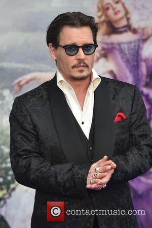 Johnny Depp "Felt Bad" For J.K. Rowling Over 'Fantastic Beasts' Casting Furore