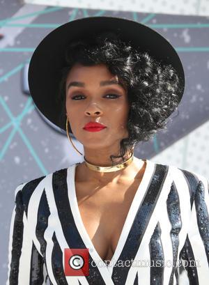 Janelle Monae seen wearing a striking black and white sequinned playsuit at the at the 2016 BET Awards held at...