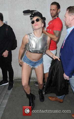 Lady Gaga visits Radio 1, Kiss FM and finally Nandos, where she buys three bags of chicken meals - London,...