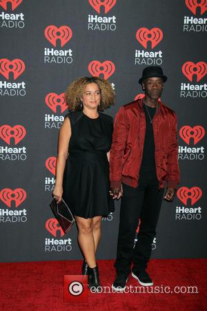 Don Cheadle and Bridgid Coulter