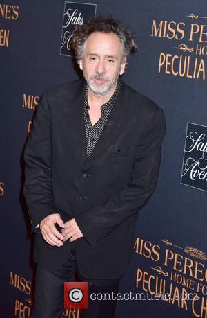 Tim Burton and Jane Goldman attending the New York premiere of 'Miss Peregrine's Home for Peculiar Children' held at Saks...