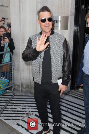 Robbie Williams Beats David Bowie's Chart Record