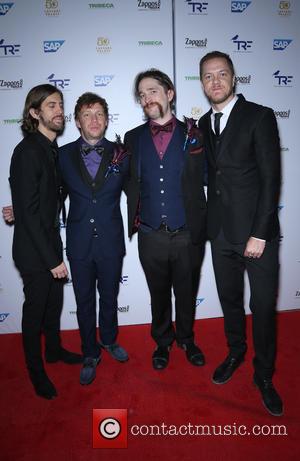 Imagine Dragons and Nolan Gould at the 'Slay Cancer With Dragons' event. Grammy award winning band Imagine Dragons perform in...