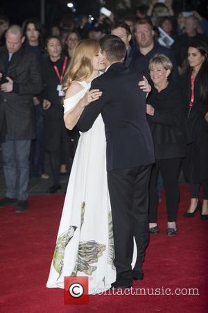 Amy Adams and Jeremy Renner