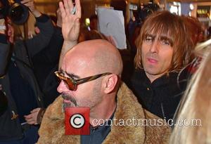 Paul Bonehead Arthurs and Liam Gallagher