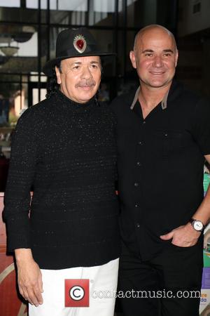 Carlos Santana and Andre Agassi