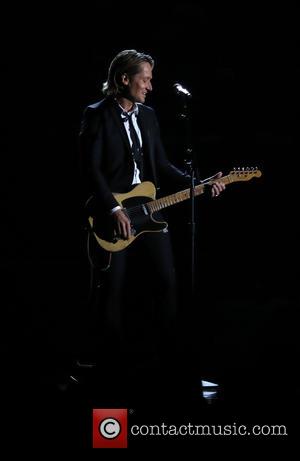 Keith Urban on stage at the 50th annual CMA (Country Music Association) Awards held at Music City Center in Nashville,...