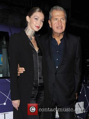 Gigi Hadid and Mario Testino arrive at the Royal Academy of Arts, for the Stuart Weitzman VIP dinner - London,...