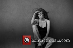 Julianne Moore photographed by Peter Lindbergh for the 2017 Pirelli Calendar, the forty-fourth edition of the iconic calendar.  -...