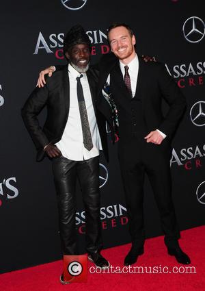 Michael Fassbender and Michael K. Williams