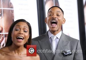 Naomie Harris and Will Smith