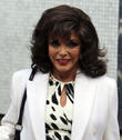 Joan Collins' First Husband Attempted To Sell Her To Sheikh