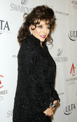 Joan Collins Helps Raise Thousands For Charity