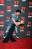 Val Chmerkovskiy and Laurie Hernandez